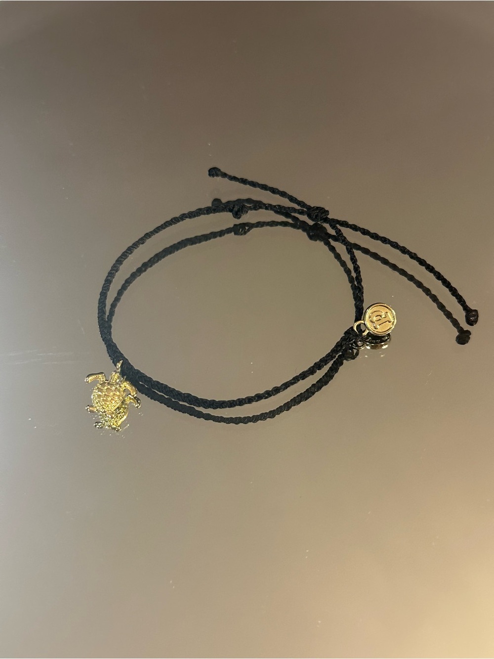 Pura Vida. Black Braided Cord Bracelet with Gold Turtle Charm